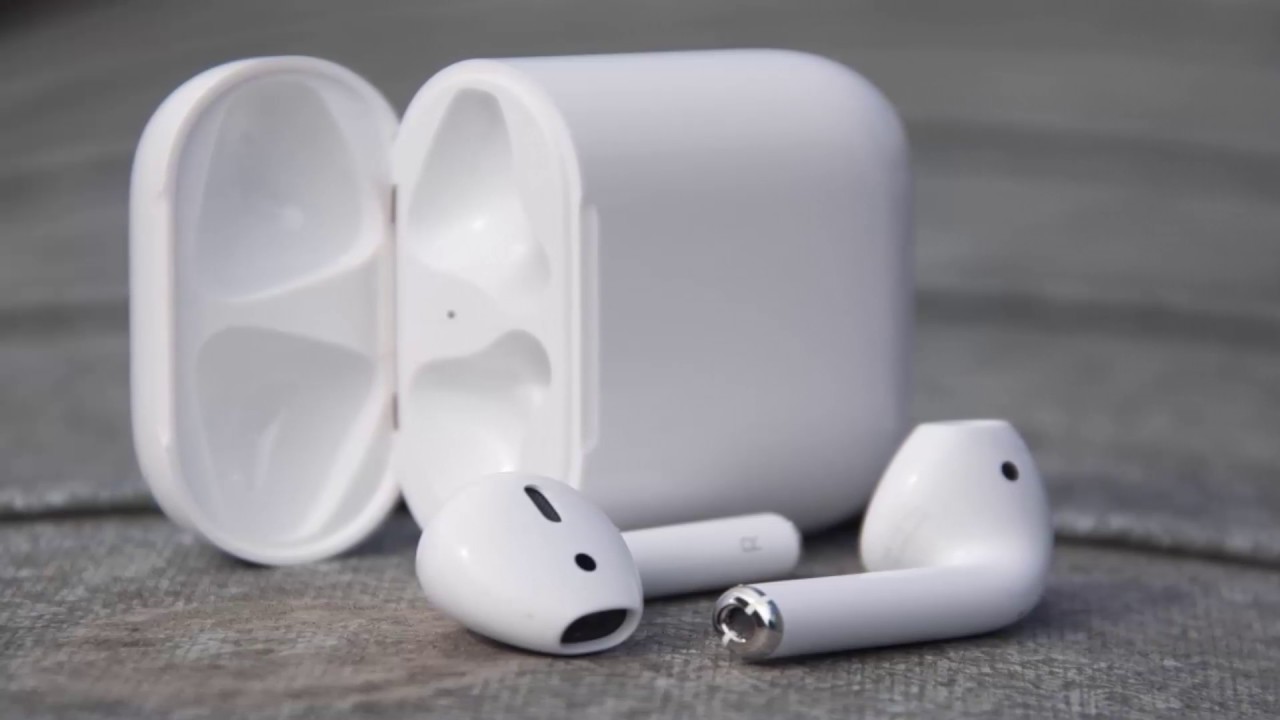Apple AirPods with their charging case