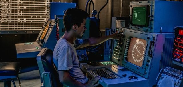 man at workplace being productive