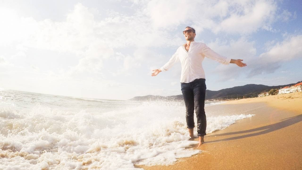 A man enjoying moment at the beach