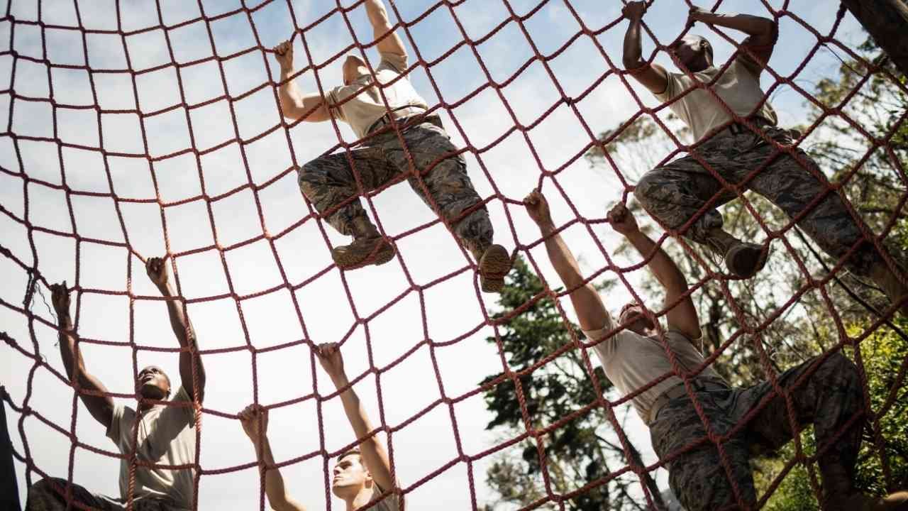 Military Soldiers Climbing rope