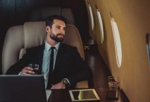 A guy sitting in a private jet