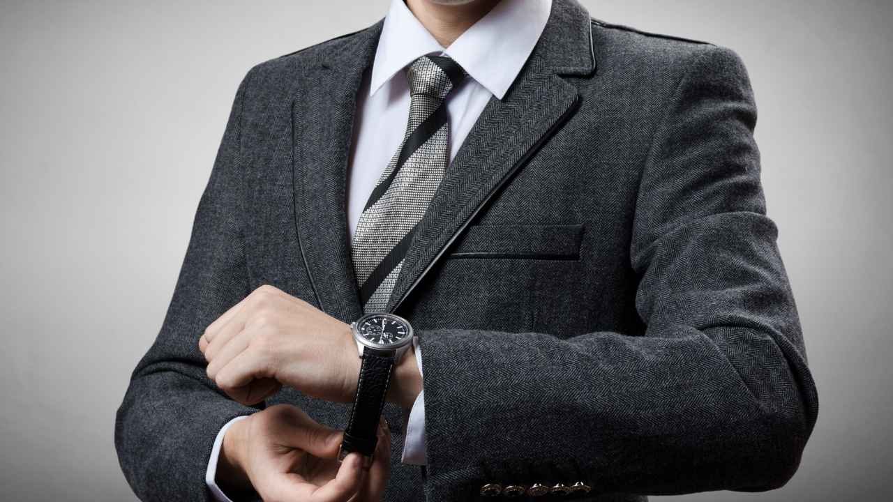 A guy wearing a dress watch