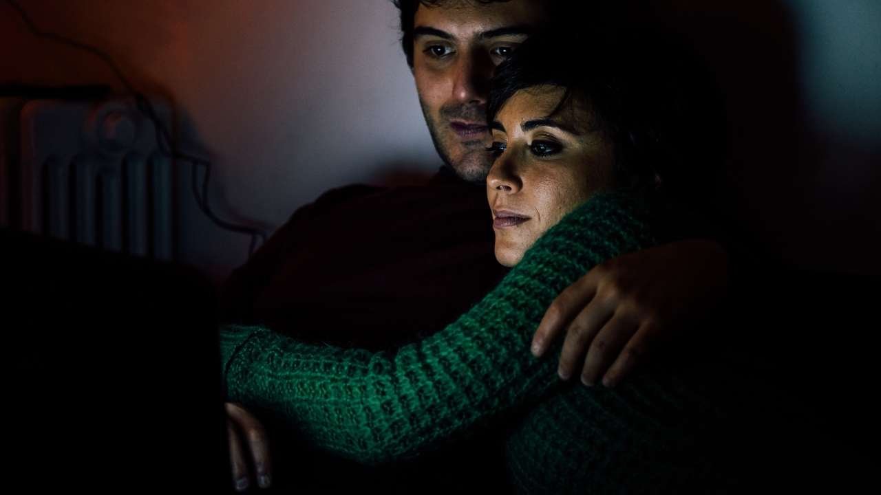 couple watching laptop