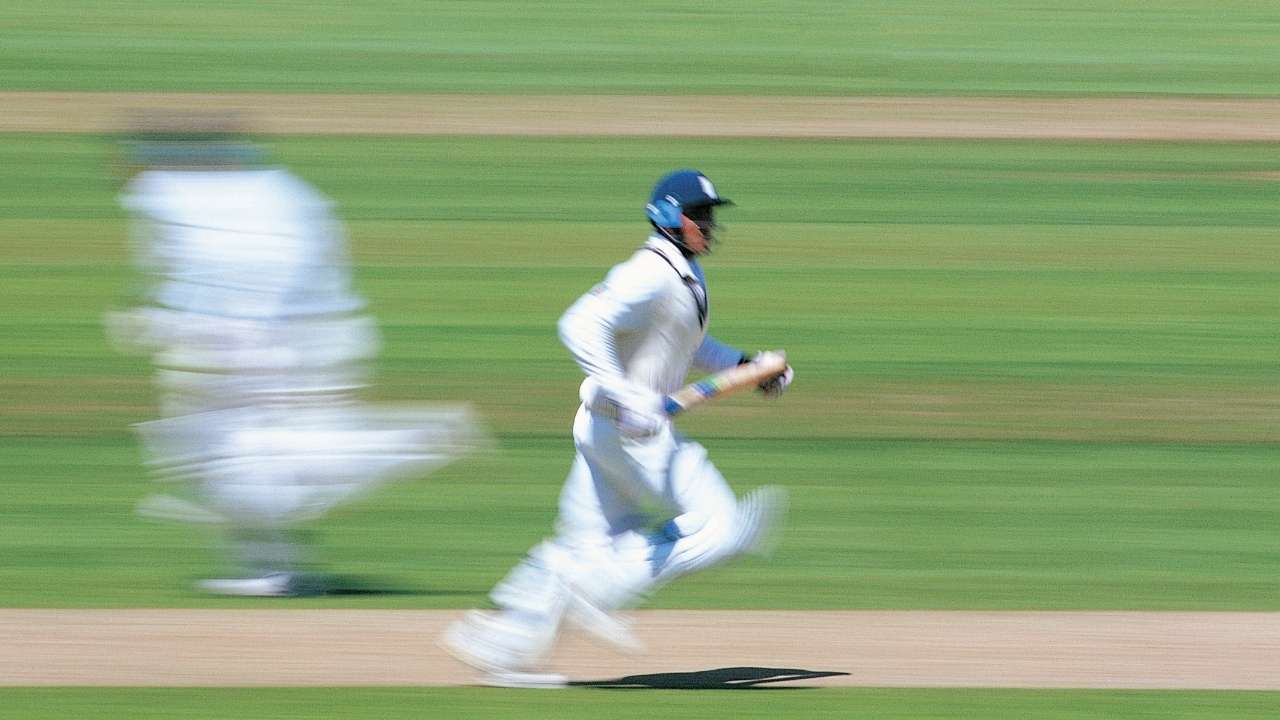 A cricket player running