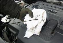 Checking oil level in car engine