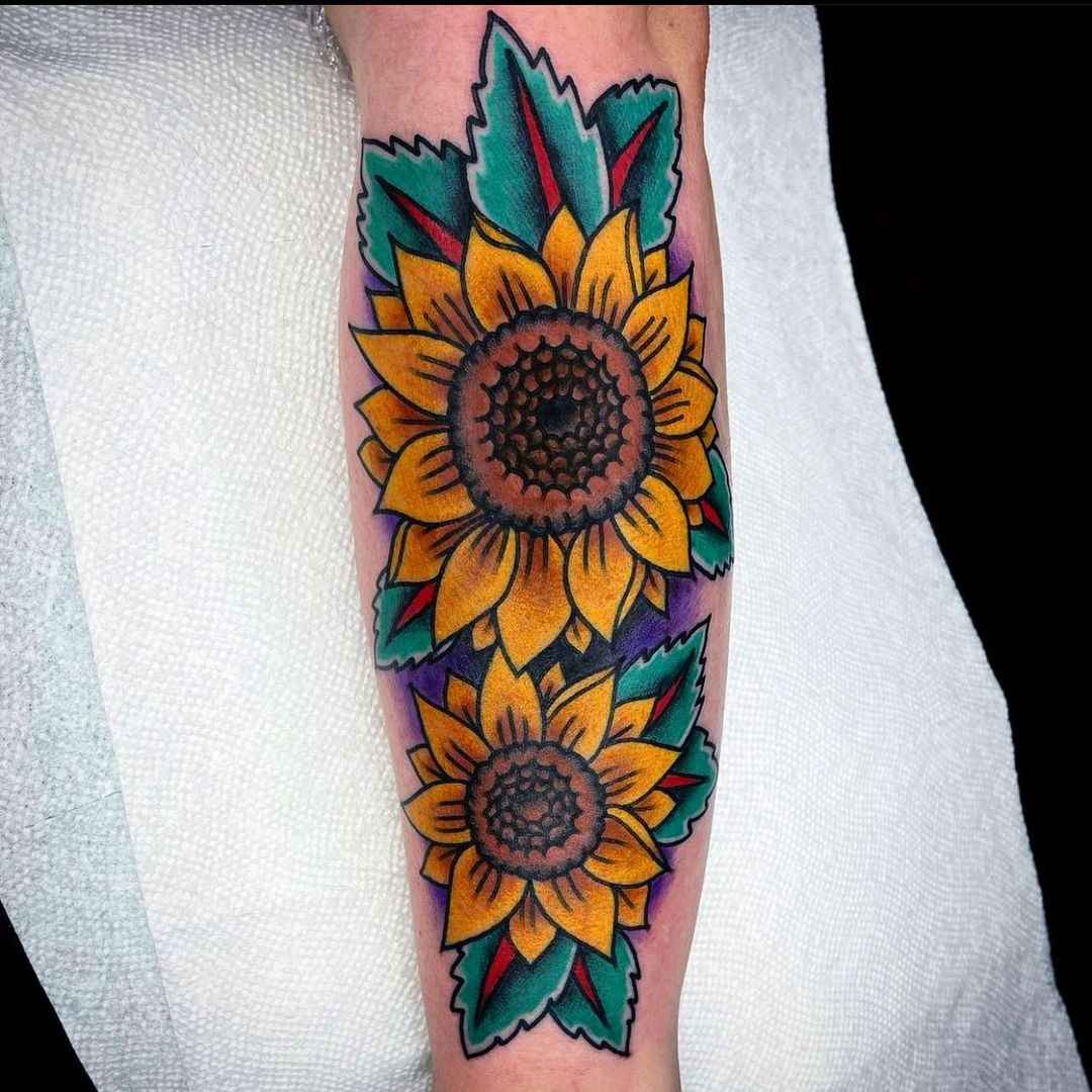 sunflower tattoo on forearm