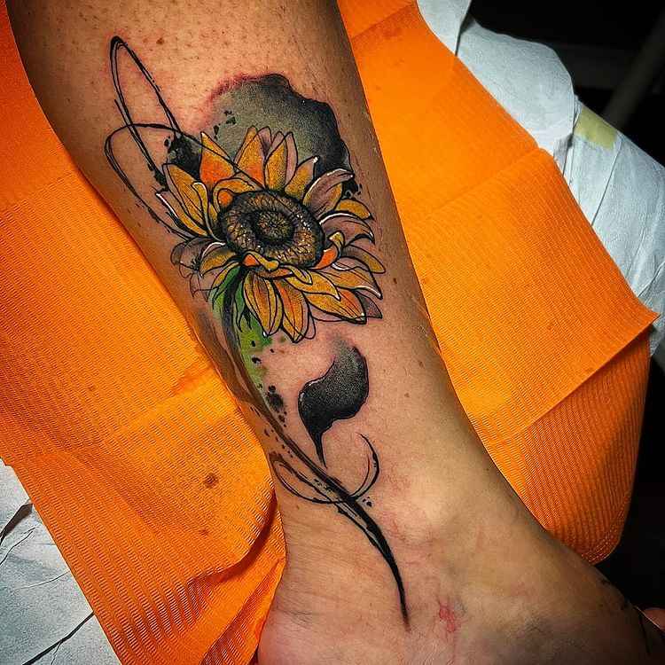 sunflower tattoo on leg