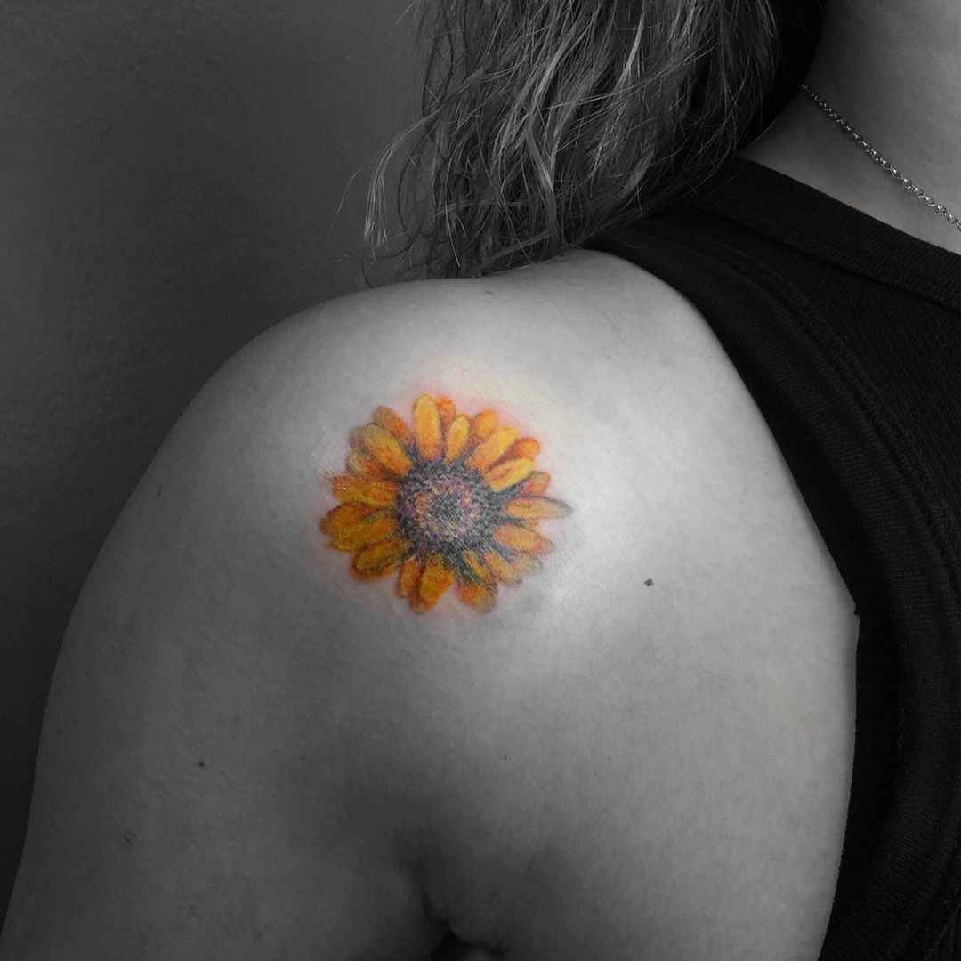 sunflower tattoo on shoulder