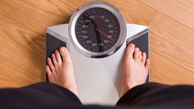 guy checking weight