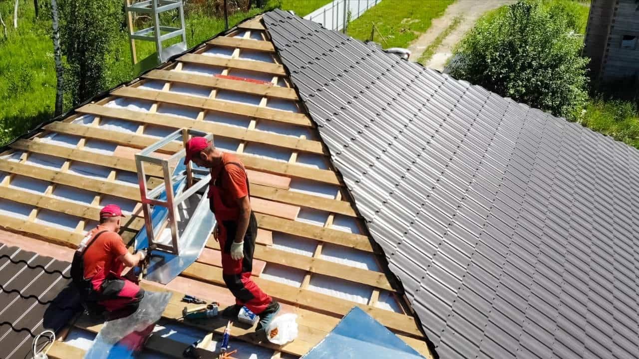 workers installing Roofing Materials
