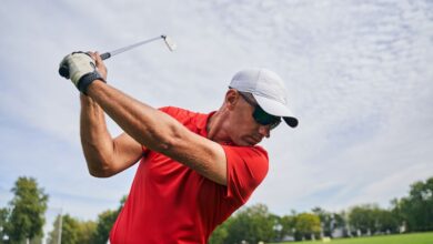 male golfer doing a gold swing