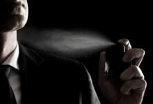 a guy applying Fragrance