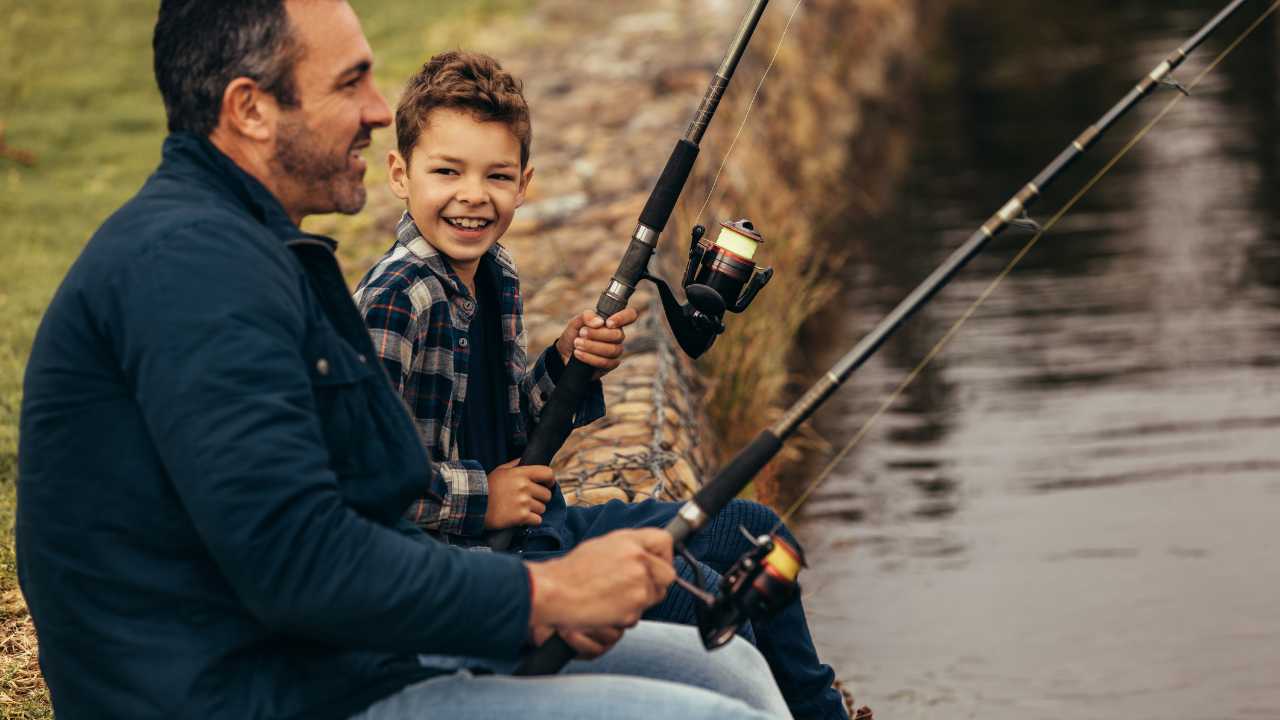 A guy fishing with his son